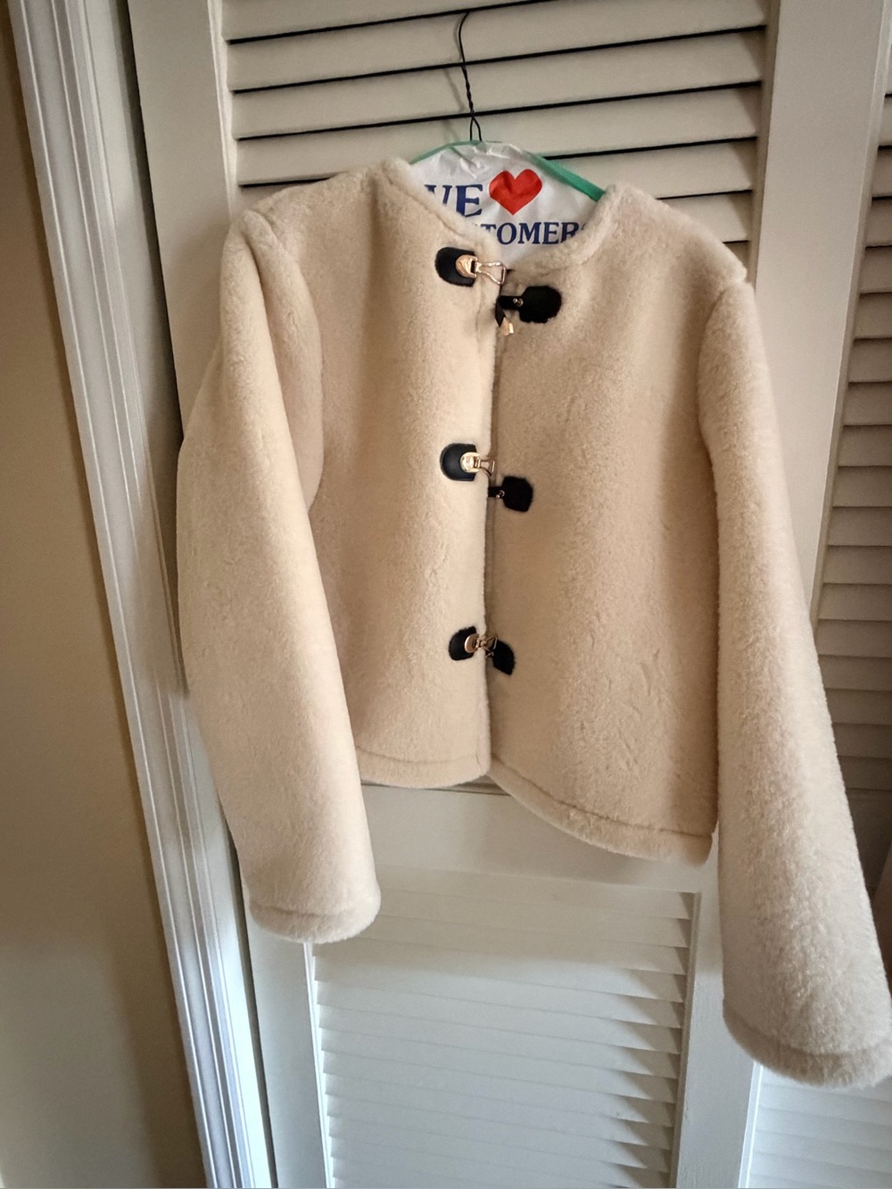 Zara women’s Cream Faux-Shearling Toggle Jacket